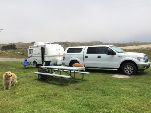 The sand dunes and the ocean are behind me as i take this picture.