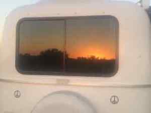 Last evenings sunset reflected in WS's  newly tinted read window.